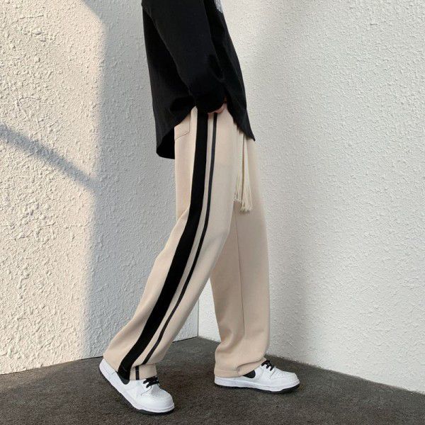 Casual pants men's autumn new style Hong Kong fashion brand striped loose pants men's straight leg wide leg sports pants 