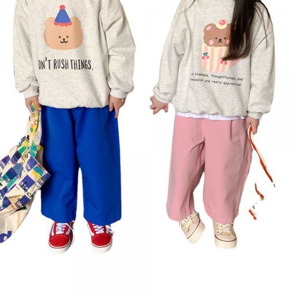 Children's trousers issued on behalf of 2023 spring boys and girls' Korean version of solid color straight trousers for children's multicolor loose wide leg trousers 