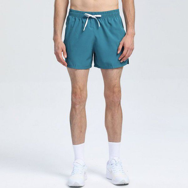 American sports quick-drying three-way shorts Men's marathon new loose breathable running football training pants